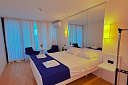 Orbi City Apartment - Изображение 0